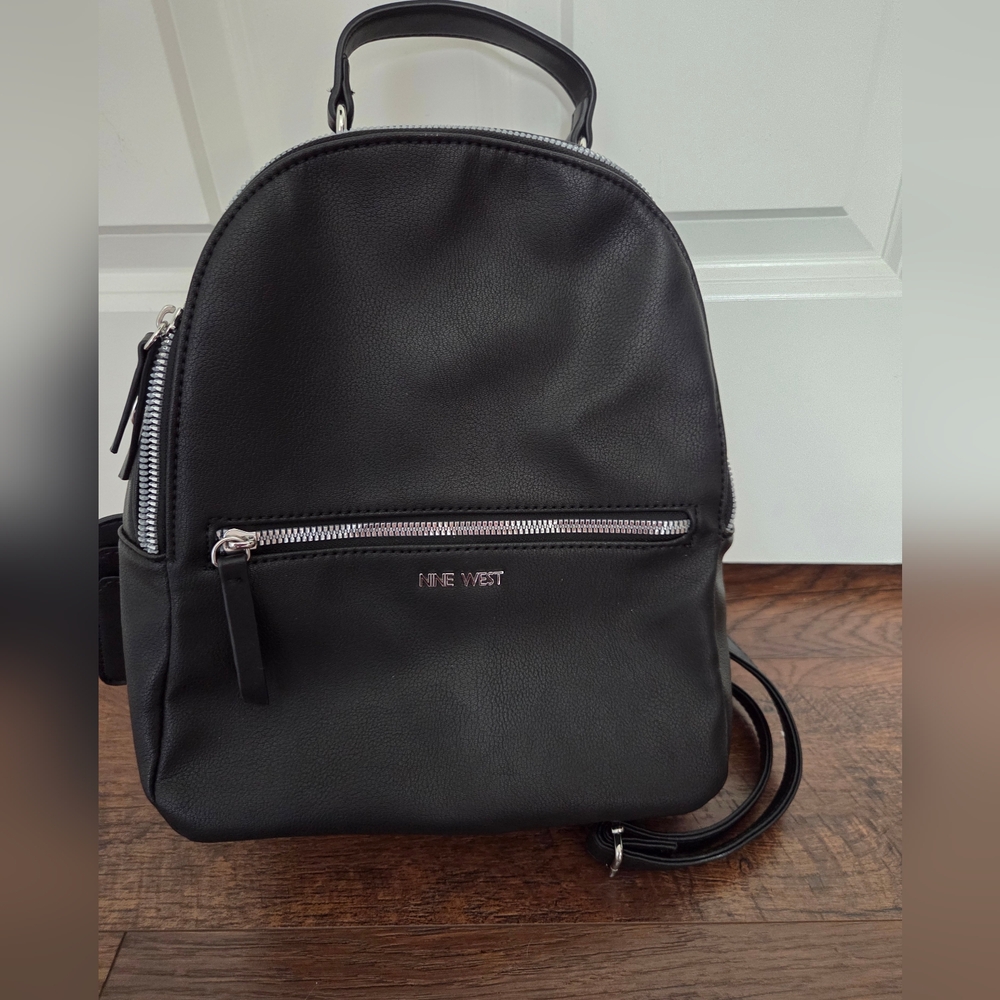 New Nine West Black Backpack. Adjustable straps & room for all your things.